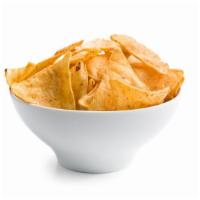 Tortilla Chips · Warm and crispy tortilla chips.