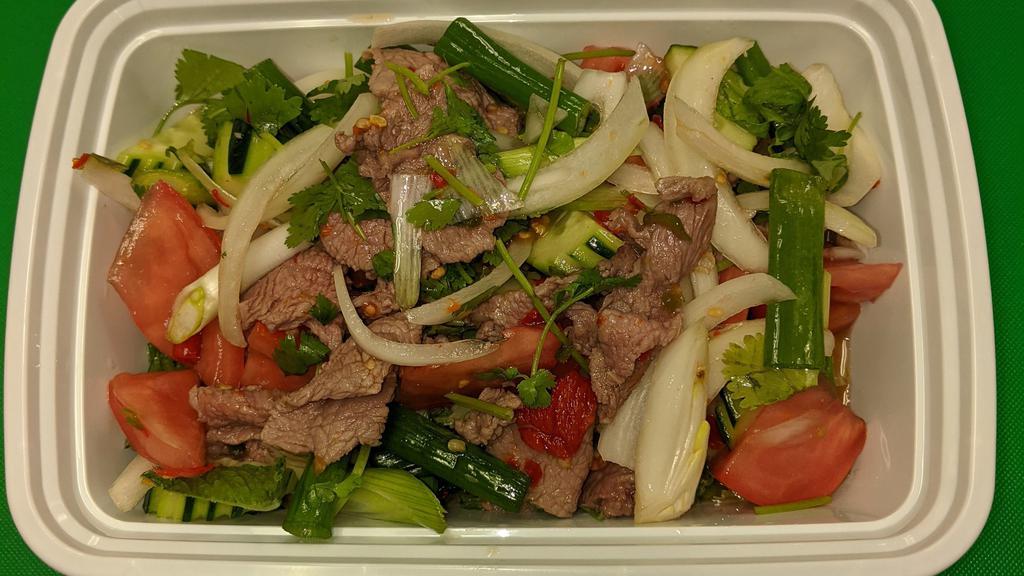 Beef Salad ( Yum Nuer) · Spicy. Onions, tomatoes, cucumbers, lettuce, cilantro, mint, fresh chili and lime juice.