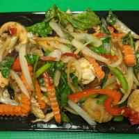Thai Basil  · Stir-fried garlic, fresh chili, onion, bell pepper, carrot, mushroom and basil leave.