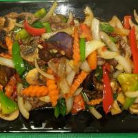 Spicy Eggplant · Stir-fried garlic, fresh chili, onion, bell pepper, carrot and basil leave.