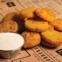 Fried Pickles With Ranch · Irresistible pickle slices fried to perfection and served with a side of Ranch.