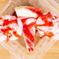 Strawberry Dream · Slice Of Strawberry Cheesecake , served with Strawberry ice cream ++ a drizzle of strawberry...