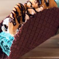 Monster Ink · Oreo and chocolate chip ice cream, topped with whipped cream, chocolate chip cookie, and cho...
