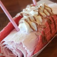 Strawberry Shortcake · Strawberry and graham cracker ice cream with cookie butter, topped with whipped cream, straw...