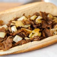 Philly King Steak Sandwich · 8” Philly steak sandwich loaded with grilled steak and onions on a toasted hoagie roll
