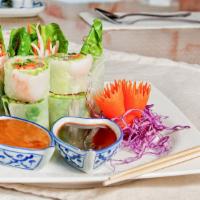 Fresh Spring Rolls · Shrimp, cucumber, carrot, mint, basil, and lettuce wrapped in rice papers and served with a ...