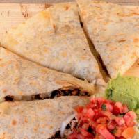 Quesadilla · Choice of filling, choice of salsa with mozzarella cheese in a flour tortilla, garnished wit...