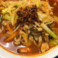 Challenge Ramen · Hot and spicy soy sauce based chicken broth, topped with stir-fried chicken and vegetables, ...