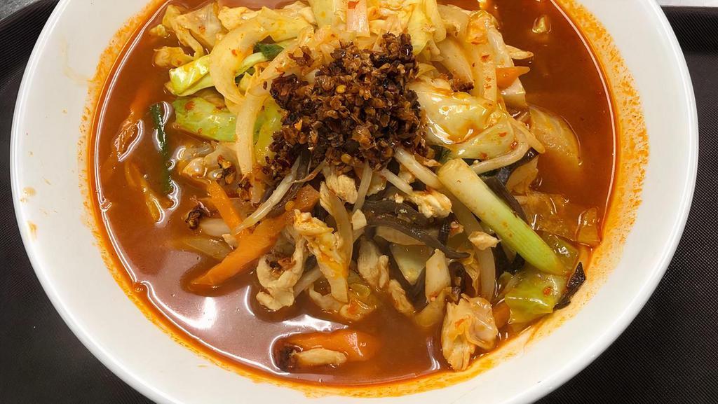 Challenge Ramen · Hot and spicy soy sauce based chicken broth, topped with stir-fried chicken and vegetables, your choice in the degree of spiciness.