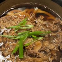 Niku Udon · Topped with thinly sliced beef and onions in sweet soy sauce broth.