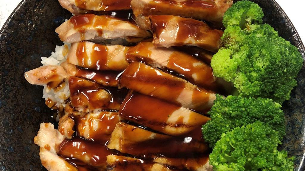 Chicken Teriyaki Don · Bowl of rice, topped with grilled chicken, drizzled with house teriyaki sauce and steamed broccoli.
