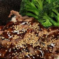 New York Steak Don · Bowl of rice, topped with new York steak drizzled with house teriyaki sauce and steamed broc...