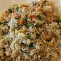 Pork Fried Rice · Stir-fried rice with pieces of chashu, carrot, peas and green onions.