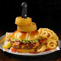 Western Bacon Burger · It's like a burger with spurs. BBQ Sauce, melted cheddar, bacon and onion rings all wrangled...