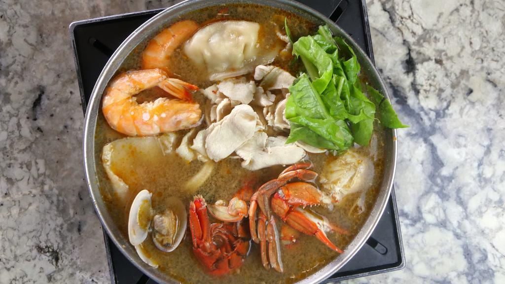 Hai De Pot  · Shrimp, lobster tail, clam, mussel, calamari, fish fillet, blue crab, enoki mushroom, scallop, seaweed knot, cabbage, fish ball, iced tofu, imitation crab meat, gyoza and a choy.