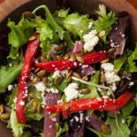 Ensalada · Mixed greens, grilled red peppers and onions, pumpkin seed, queso fresco, cumin vinaigrette.