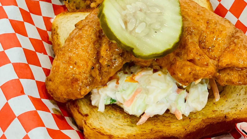 #2 Chicken Tender · Chicken Tender served over a slice of white bread with coleslaw and pickle