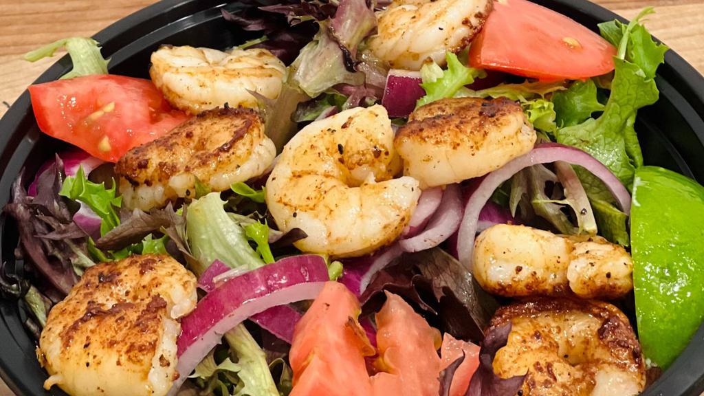 Grilled Shrimp Salad · 8 Grilled Shrimp, mix greens, tomato, onion and Feta cheese.