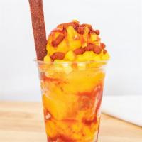 Mangonadas · Chamoy, Tajin, Mango Pieces, Tamarind Candy, Lime.