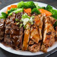 Chicken & Beef Veggies Teriyaki Bowl · Includes rice, and green onions, and steamed veggies.