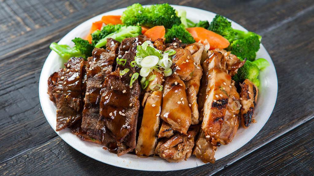 Chicken & Beef Veggies Teriyaki Bowl · Includes rice, and green onions, and steamed veggies.