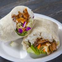 Chicken Burrito · Includes cheese, lettuce, rice, and teriyaki sauce all wrapped in a large tortilla. Cut in h...