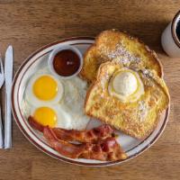 French Toast Combo · With two eggs, four French toast wedges and choice of two sausages or two bacon.