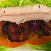 Superbird Sandwich · Our turkey, bacon, & avocado sandwich served with lettuce, tomato, pickles, onions, mustard ...