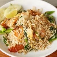Fried Rice · Fried rice with choice of meat, Chinese broccoli, onion, tomato and egg.