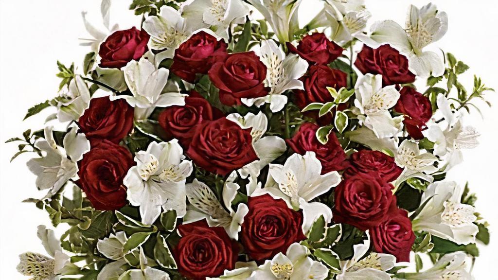 Endless Romance Bouquet · Favorite. Endless roses, endless romance! Make a statement with our stunning bouquet of red roses with snowy white blossoms, delivered in a glass hurricane vase that will forever remind her of your love. Includes red spray roses, white alstroemeria and pretty pitta negra. Delivered in a glass hurricane vase.