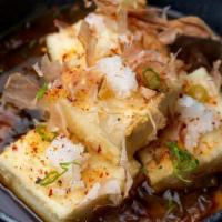 Agedashi Tofu · 48 Hour Aged Shiitake Broth, Fried Tofu, Grated Daikon, Bonito Flakes, Green Onion, House To...