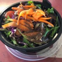 Side Salad · Spring Mix, Purple Cabbage, Carrots, Cherry Tomatoes, With Balsamic Vinaigrette dressing.