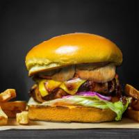 Western Bacon Bbq Cheeseburger Combo · Onion rings, cheese, and BBQ sauce on a Brioche hamburger bun. Served with French fries