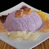 Halo-Halo · Taro snow, jack-fruit, coconut strings, red and white beans,  and condensed milk. 
(flan , p...