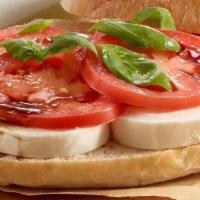 Caprese Sandwich · Fresh baked ciabatta, buffalo mozzarella, heirloom tomato, basil, balsamic glaze, EVOO. Add ...