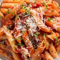Penne Arribiata · Penne, oven roasted grape tomatoes, garlic and basil sautéd in olive oil. Served with our ho...