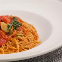 Capellini Checca · Capellini with chopped tomatoes, roasted garlic, fresh basil and virgin olive oil.
