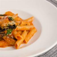 Penne  Siciliana · Penne with eggplant, smoked mozzarella, chopped tomatoes, fresh basil and virgin olive oil.