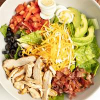 Cobb Salad · Chopped lettuce, tomatoes, carrots, bacon, fresh avocado, grilled chicken breast, cheese, ch...
