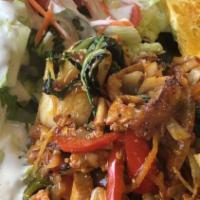 Spicy Chicken Stir Fry · Marinated chicken, cabbage, bell peppers, onions, sautéed in hot chili garlic sauce.