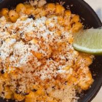 Esquites · Fire roasted corn, chipotle aioli, toasted chile de arbol, lime, cotija.