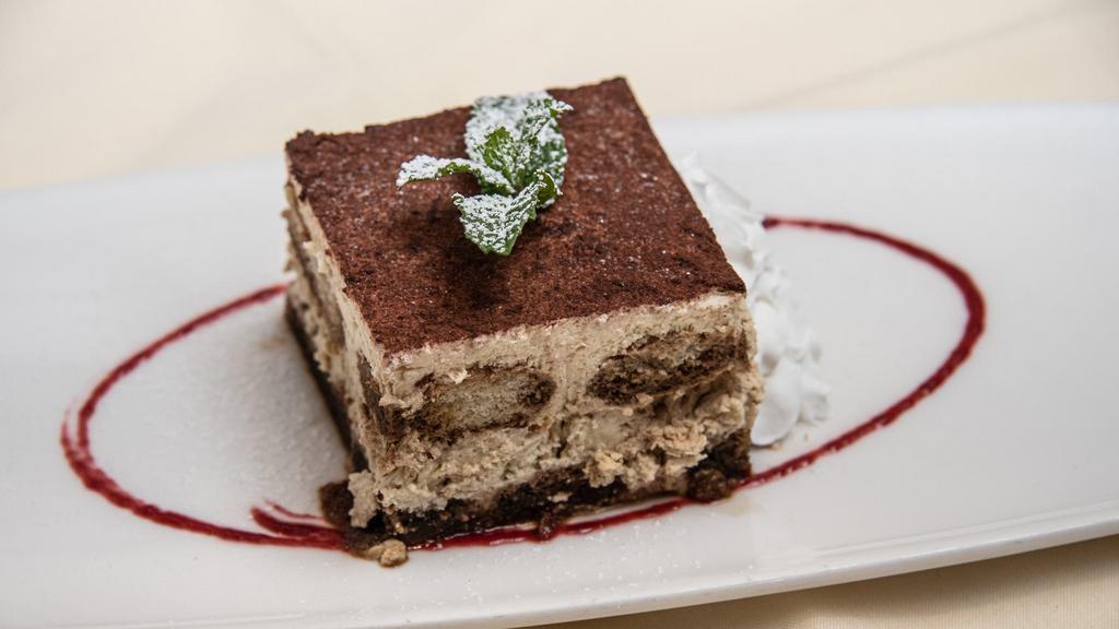 Tiramisu · Layers of lady fingers dipped in espresso, mascarpone cheese and cocoa powder.