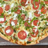 Pesto Pizza - Med · Housemade pesto sauce, fresh tomatoes, mozzarella cheese and ricotta cheese. Topped with fre...