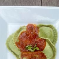 Spinach Ravioli · Made with our homemade Marinara and comes with a side of Garlic Bread.