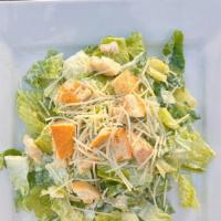 Classic Caesar Salad · Romaine lettuce, shaved Parmesan cheese and croutons. Includes Caesar dressing and homemade ...