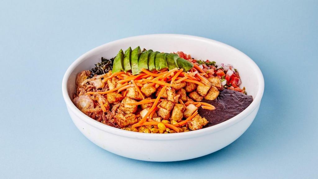 Vegan Banh Mi Bowl · 36 hour marinaded tofu, crispy kale, pickled carrot, avocado, crispy onion, spicy house citrus ponzu, street corn relish, black beans, pico de gallo, avocado tomatillo salsa, pineapple habanero salsa