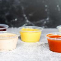 Side Of Dipping Sauce Or Tender Seasoning · 