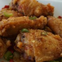 Salt & Pepper Chicken Wings (6 Pieces) · Spicy. Deep fried chicken wing miscuts. Stir fried with onion, jalapeño, and bell pepper. Se...