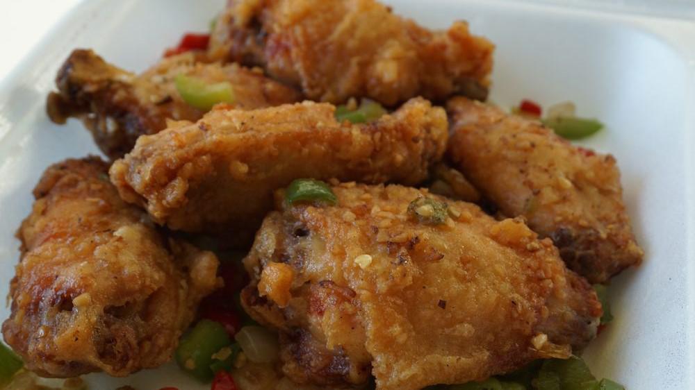 Salt & Pepper Chicken Wings (6 Pieces) · Spicy. Deep fried chicken wing miscuts. Stir fried with onion, jalapeño, and bell pepper. Seasoned with spicy sauce, sea salt, and pepper. Average time between 10-15 mins.