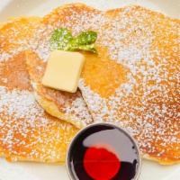 3 Stack Of Pancakes · 3 Fluffy Buttermilk, Strawberry, Banana, or Chocolate Chip Pancakes served with Syrup & Butter